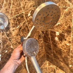 1 Year Old Shower Head With Removable Handle  $30.00