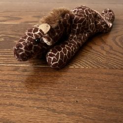 Tan and brown spotted 9 inch giraffe plush toy