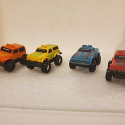 Vintage Lot of 4 1980's McDonald's Schaper Stomper 4x4 Mini Trucks Non Powered