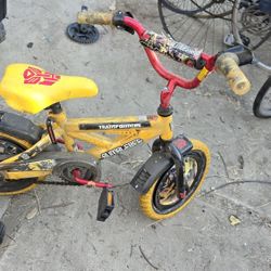 Transformers bike 12in with training wheels 