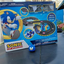 NKOK Sonic the Hedgehog Racing Transformed RC Slot Car Set plus a Set of Sonic the Hedgehog Ear Buds
