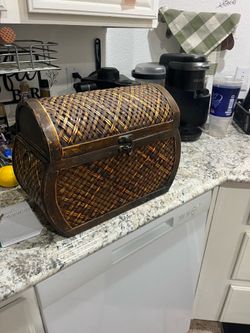 Wicker storage basket with handles