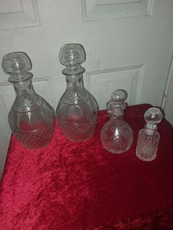 Set of 4 Cut Glass Decanters with Stoppers