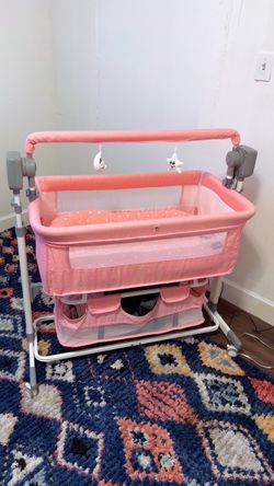 Crib rocking bassinet Bluetooth