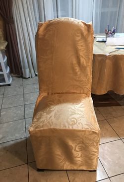 6 Chairs with new covers.