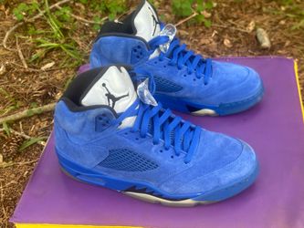 10.5 Jordan 5 Retro 'Blue Suede' sneakers, distinguished by their vibrant royal blue suede upper and silver reflective tongue.