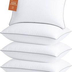 4 Full Sized Pillows
