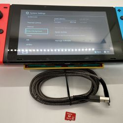 Nintendo Switch Console , Joy cons, Charging Cable And Memory Card