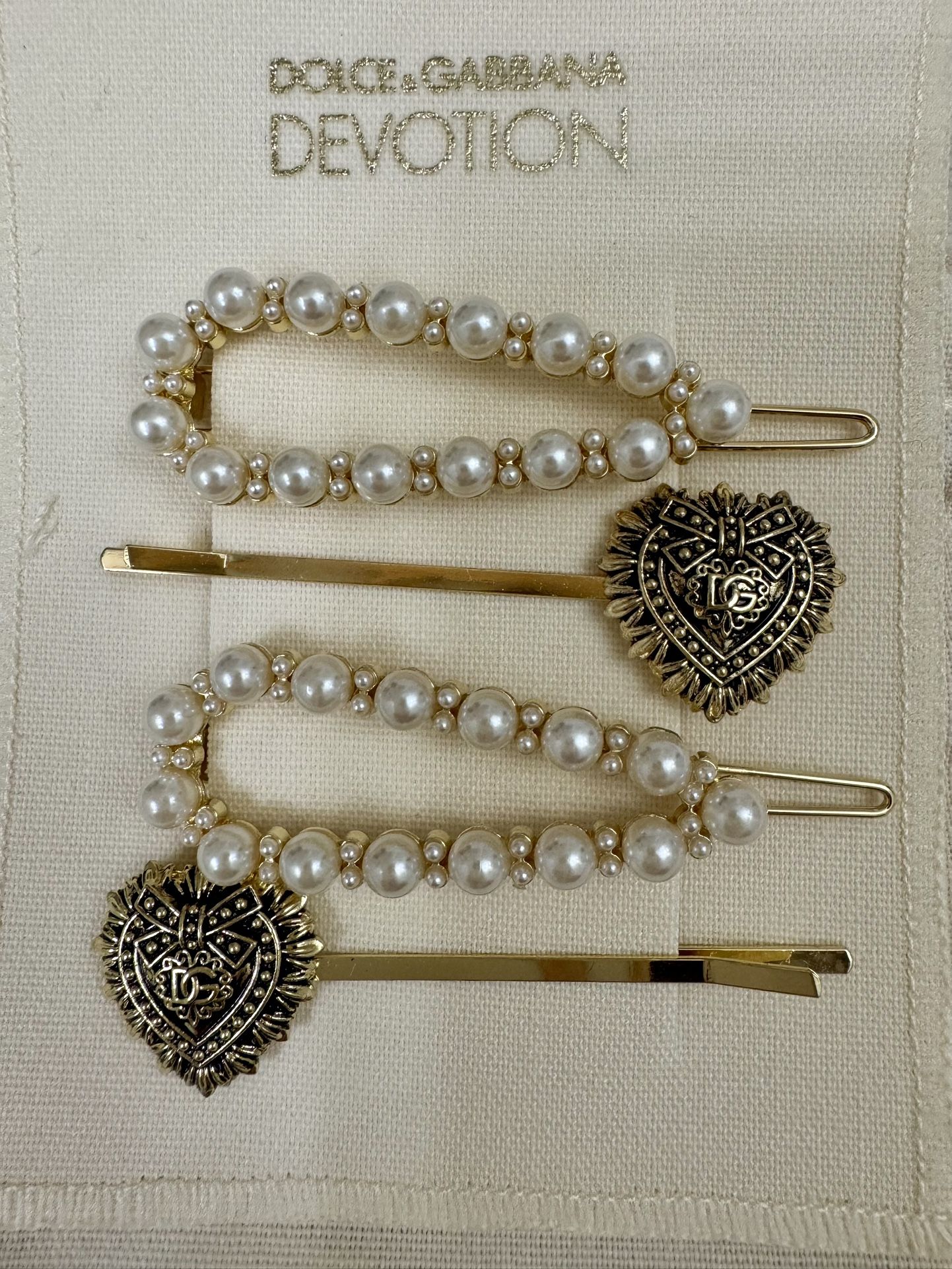 Authentic Dolce & Gabbana hair clips with pouch New