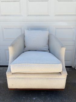 White swivel couch chair
