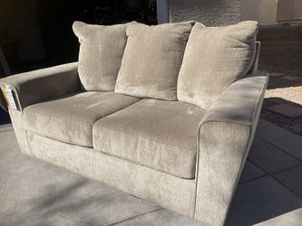 Brand New Ashley Taupe Loveseat