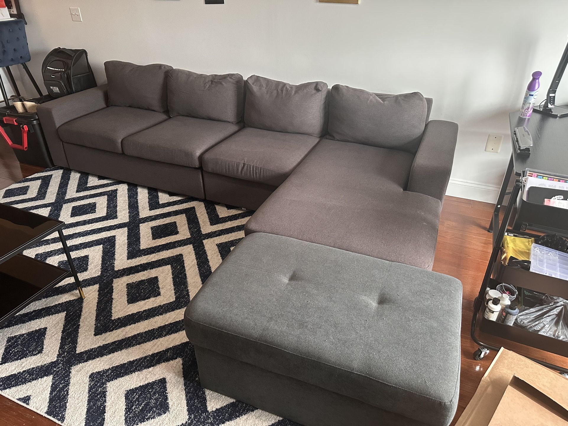 Dark Grey Sectional With Ottoman