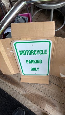 3 new in the box motorcycle parking signs