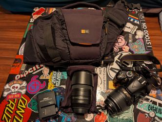 Nikon D3200 DSLR Camera; 18-55mm & 55-300mm Lenses, Extra Batter & Charger; Case Logic Bag