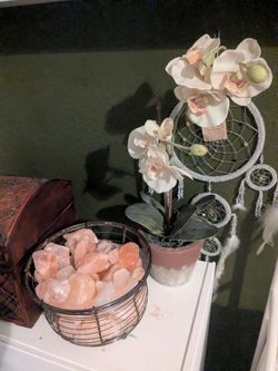 Faux ivory orchids in pot
