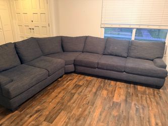 Blue upholdered sectional sofa couch