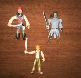 DISNEY PIRATES OF THE CARIBBEAN FIGURES. LOT OF 3 toys