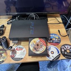 Sony PlayStation 2 PS2 Black Fat Console Model SCPH-39001 W/ 6 Games Controller  The product is a Sony PlayStation 2 original console, complete with a
