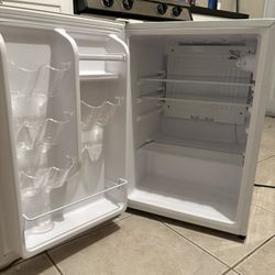 White mini fridge