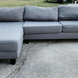 Grey color sofa sectional Confortable in  great condition and clean $195