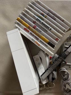 Nintendo Wii Console with Games and Controller
