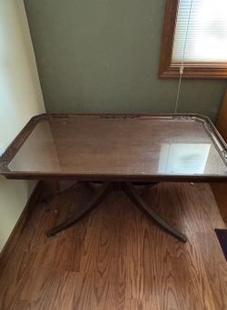 Carved Wood Coffee Table with Glass Insert
