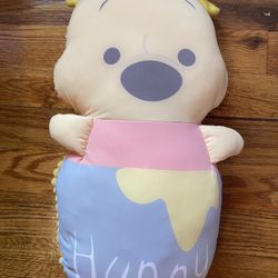 Winnie the Pooh yellow plush pillow character with ribbed back