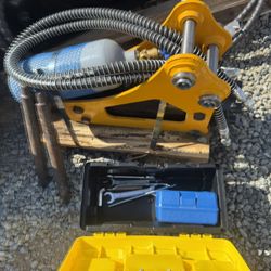Mini excavator jackhammer attachment
