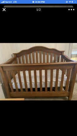 Baby crib with mattress