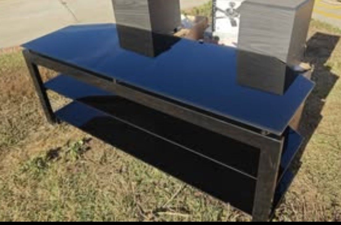 TV Stand with smoked glass shelves.