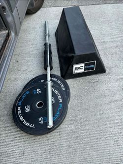 Gym Barbell Bench and Bumper Plates