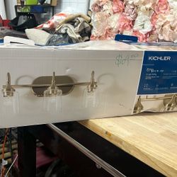 KICHLER Erta 24 in. 3-Light Champagne Bronze Bathroom Vanity Light with Clear Glass Shades