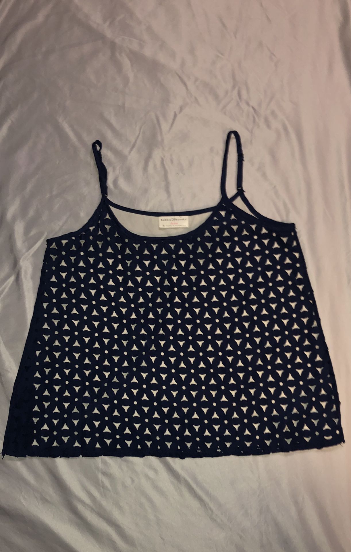 Size small (runs bigger) navy and beige tank top