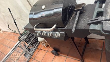 Charbroil bbq and 2 propane tanks