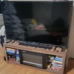 75in T.v With Fire Place TV Stand,500 Obo