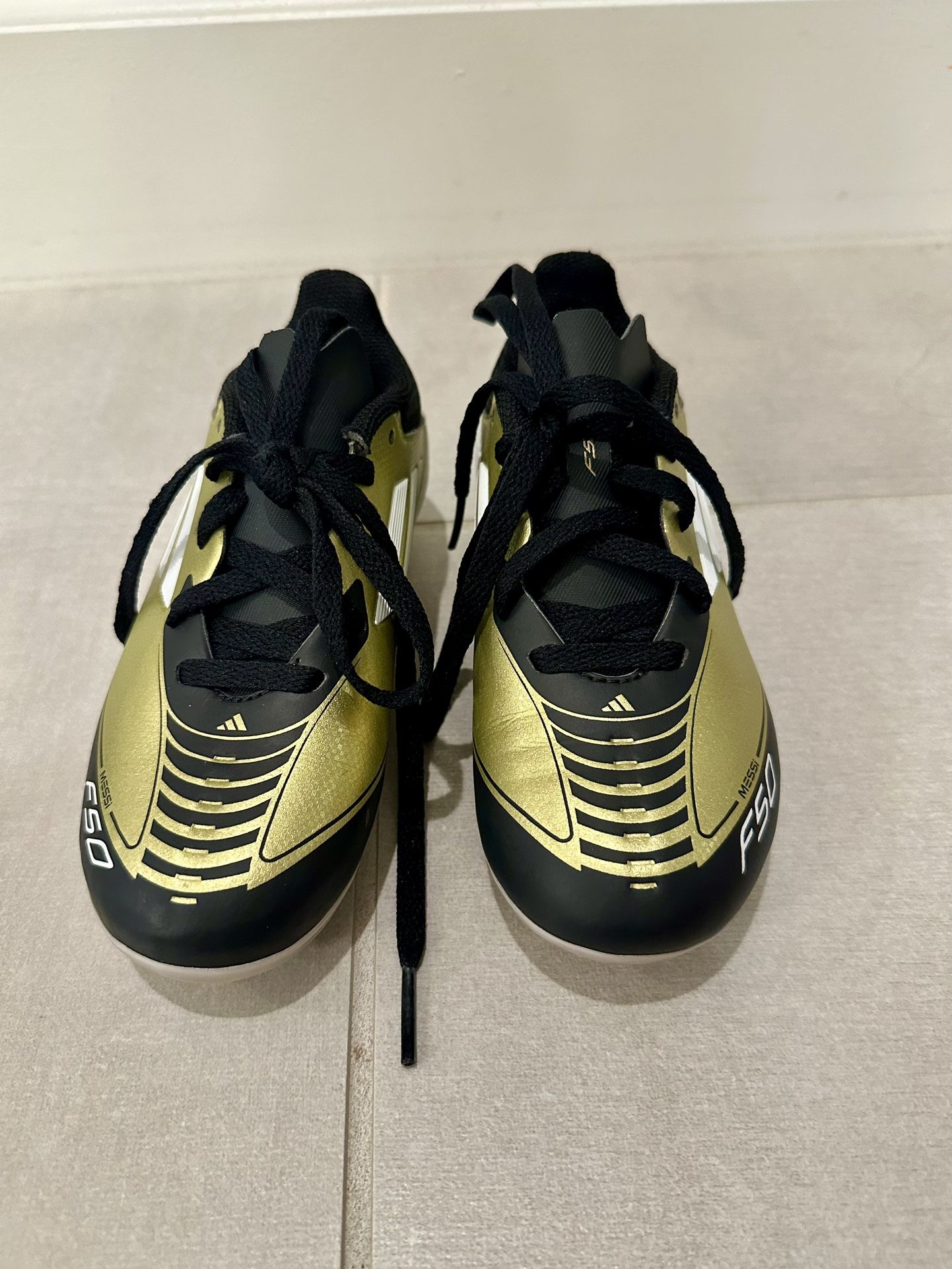 Adidas F50 Messi Club FxG Soccer Cleats, Gold Footwear White Carbon Black