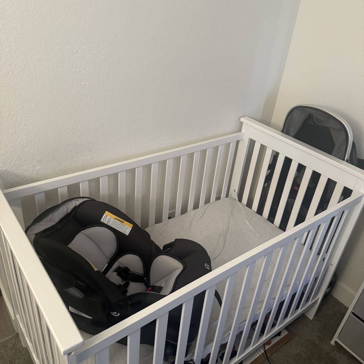 Baby Crib, Stroller, and Car Seat