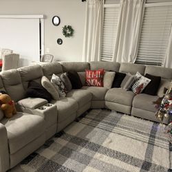 Cream Sectional With Cup holders And Charging Outlets  