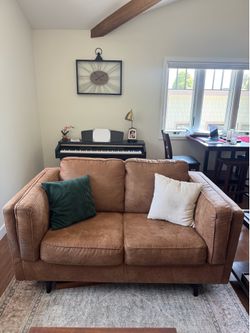 Ashley furniture brown Maimz loveseat and arm chair