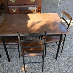 Table And 4 Chairs 