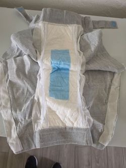 Kids no name brand diapers, ea h bag has 10 diapers
