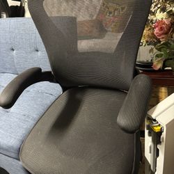 Black ergonomic mesh office chair