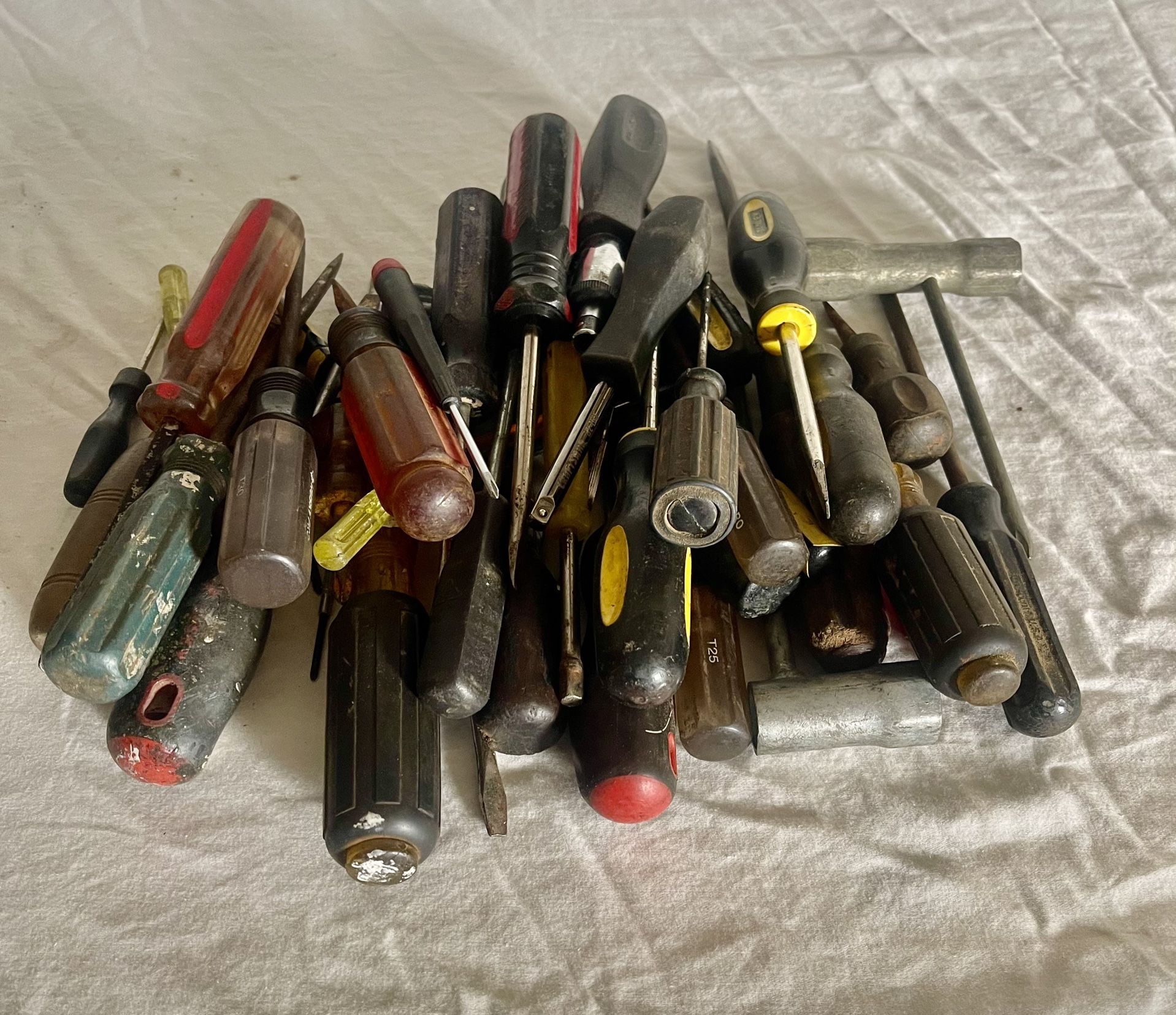 Pile Of Used Screw Drivers