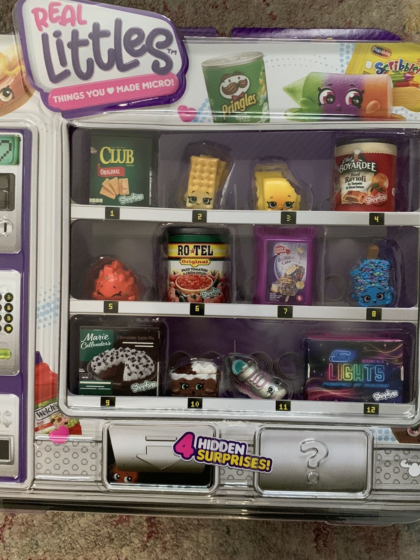 Shopkins Real Littles Vending Machine Pack New. Package has light shelf ware.