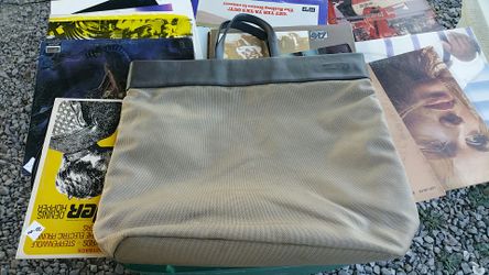 Large Tumi messenger bag Tan in color