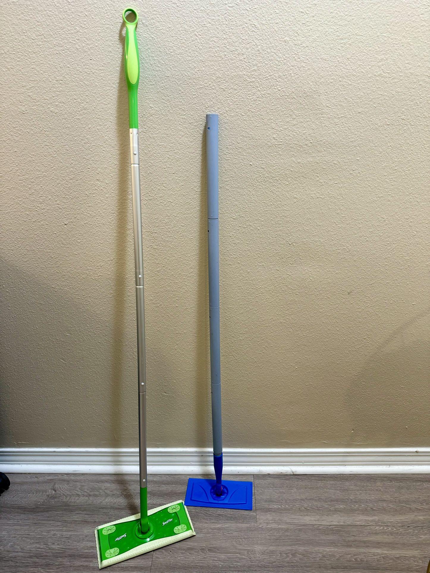 Pair Of Mopping Sticks