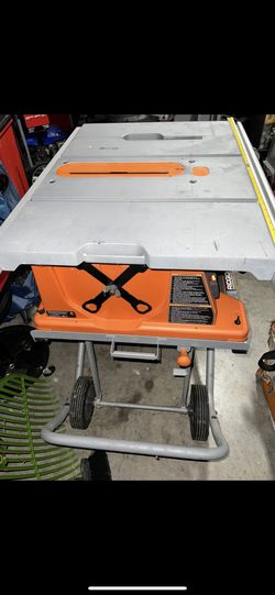 Ridgid 10inch Table Saw with rolling stand. $350