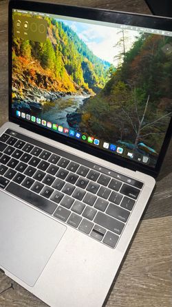 MacBook Pro withTouch Bar