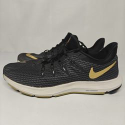 Size 7.5 US women's Nike Quest running shoes in the Black Metallic Gold