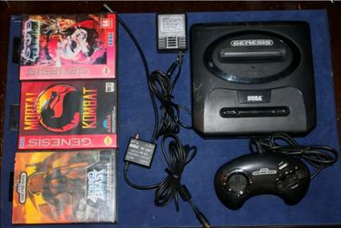 Sega Genesis with cords and games